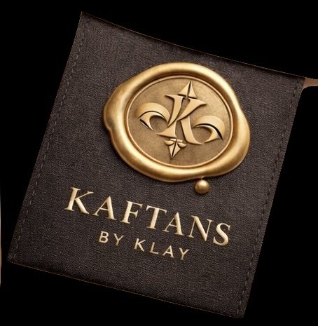 kaftans by klay pouch closed with a gold fleur-de-lis wax seal